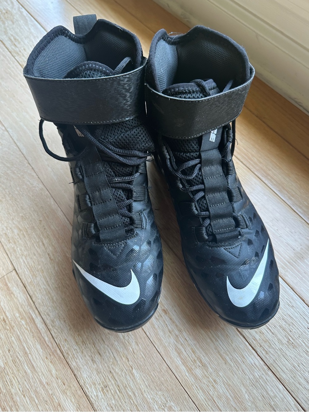 Nike Men’s Black High-Top Cleats with White Swoosh